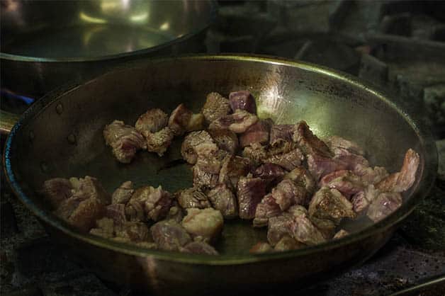 Cooking the meat on the stove