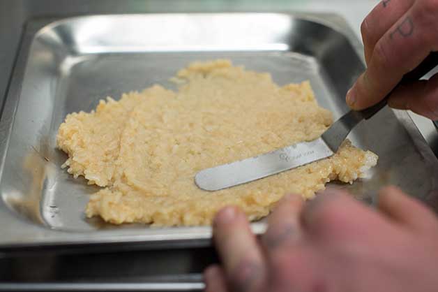 Photo of the rice crackers about to be baked in an oven
