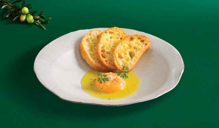 POACHED EGG YOLK IN WARM OLIVANI PURE OLIVE OIL